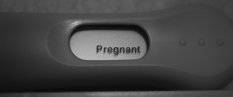 Pregnancy test display: Pregnant